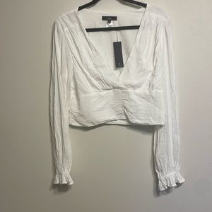 NWT! White long sleeve crop top.
